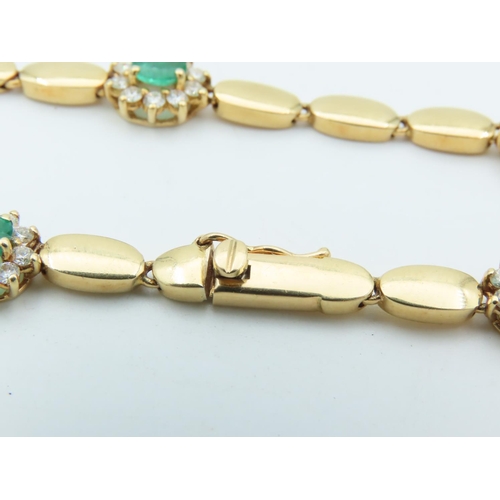 654 - 18 Carat Yellow Gold Diamond and Emerald Decorated Ladies Bracelet Articulated Form