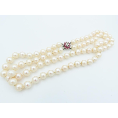 660 - Attractive Double Strand of Ladies Pearls Good Hue and Lustre with 14 Carat Gold and Diamond Set Rub... 