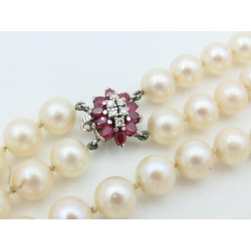 660 - Attractive Double Strand of Ladies Pearls Good Hue and Lustre with 14 Carat Gold and Diamond Set Rub... 