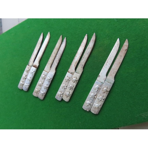 663 - Set of Eight Chinese Daggers with Detailed Decoration to Handles Each Approximately 8 Inches Long