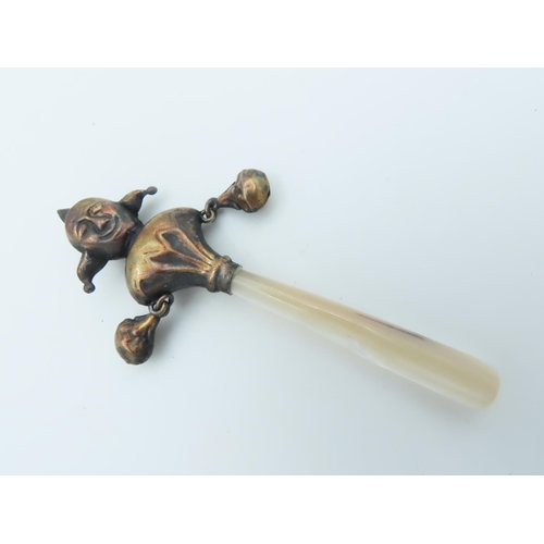 664 - Brass Mounted Jester Motif Babies Rattle with Mother of Pearl Handle