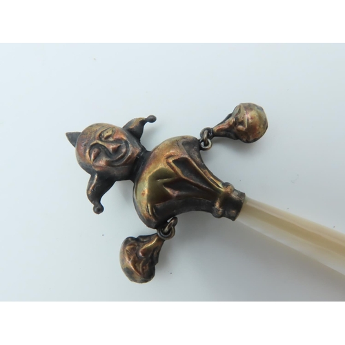 664 - Brass Mounted Jester Motif Babies Rattle with Mother of Pearl Handle