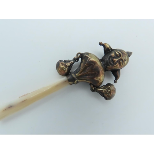 664 - Brass Mounted Jester Motif Babies Rattle with Mother of Pearl Handle