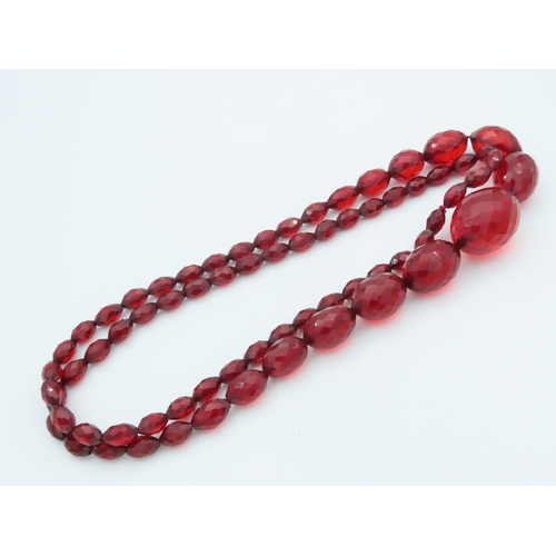 673 - Faceted Cut Cherry Amber Ladies Graduated Bead Necklace