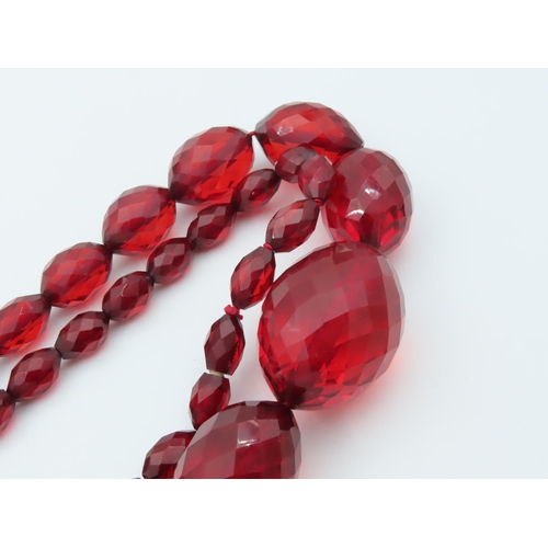 673 - Faceted Cut Cherry Amber Ladies Graduated Bead Necklace