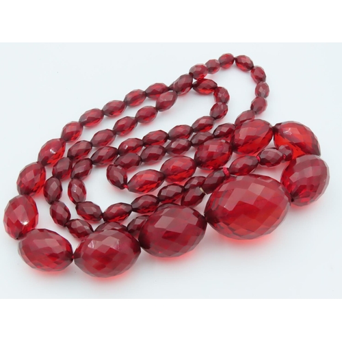 673 - Faceted Cut Cherry Amber Ladies Graduated Bead Necklace