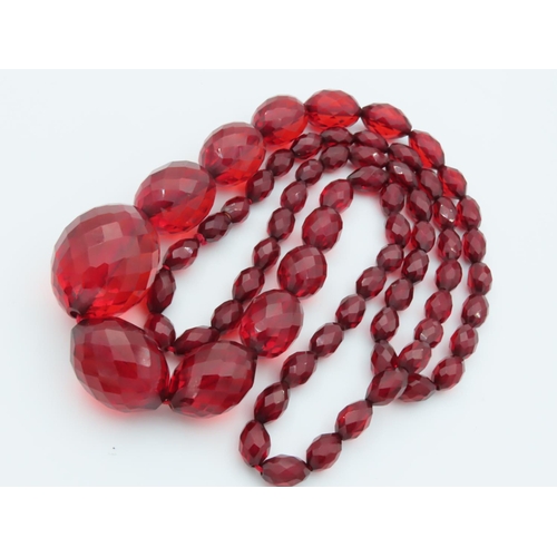 673 - Faceted Cut Cherry Amber Ladies Graduated Bead Necklace