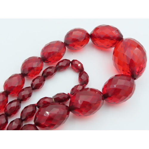 673 - Faceted Cut Cherry Amber Ladies Graduated Bead Necklace