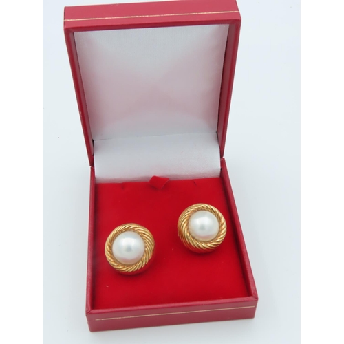 675 - Pair of 18 Carat Yellow Gold Mounted Mabe Pearl Decorated Earrings of Attractive Colour