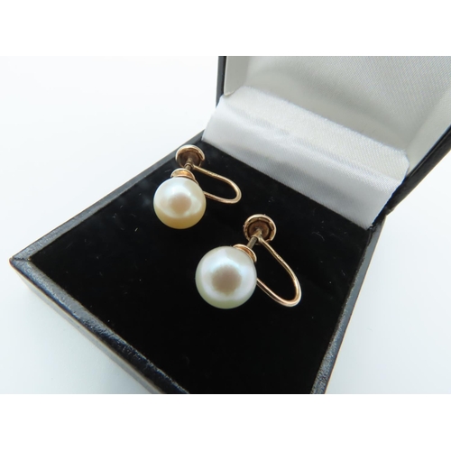 679 - Pair of 14 Carat Gold Screw On Ladies Pearl Earrings