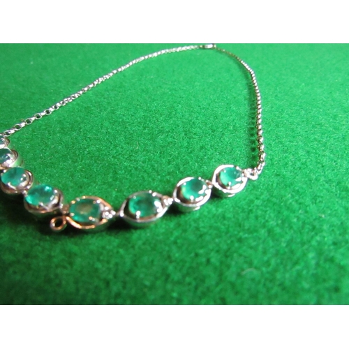 69 - Emerald and Diamond Set Ladies Necklace Front Section Set with Eight Oval Facet Cut Claw Set Emerald... 