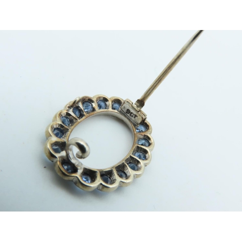 702 - Pale Blue Sapphire Brooch of Uniform Round Cut Vivid Light Blue Sapphires Mounted on 9 Carat Gold