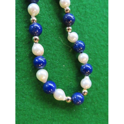 709 - Lapis Lazuli and Cultured Pearl Necklace with 9 Carat Gold Spacers