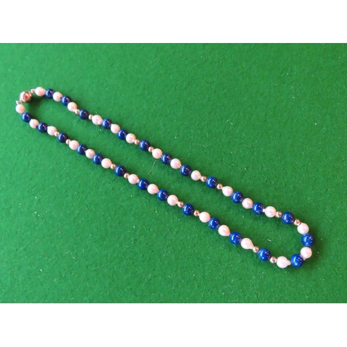 709 - Lapis Lazuli and Cultured Pearl Necklace with 9 Carat Gold Spacers