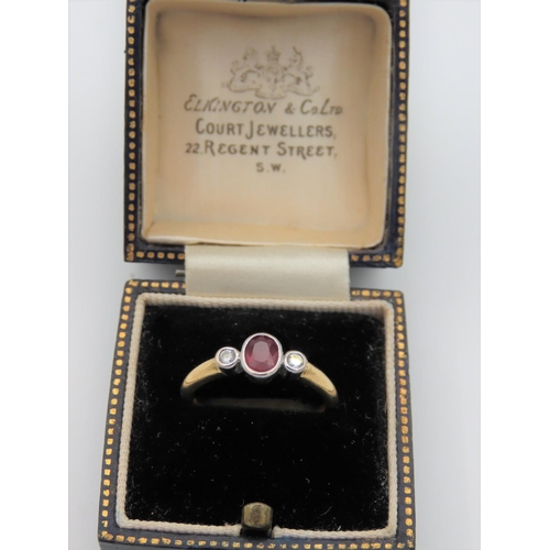 713 - Ruby and Diamond Ladies Three Stone Ring Mounted on 18 Carat Gold Size L