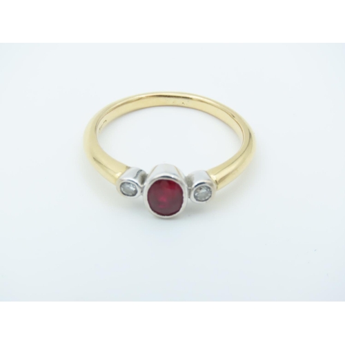 713 - Ruby and Diamond Ladies Three Stone Ring Mounted on 18 Carat Gold Size L