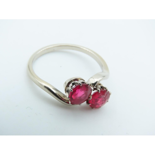 714 - Ruby Two Stone Crossover Ring Mounted on 9 Carat Gold Size K and a Half