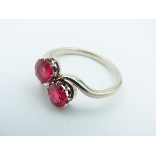 714 - Ruby Two Stone Crossover Ring Mounted on 9 Carat Gold Size K and a Half