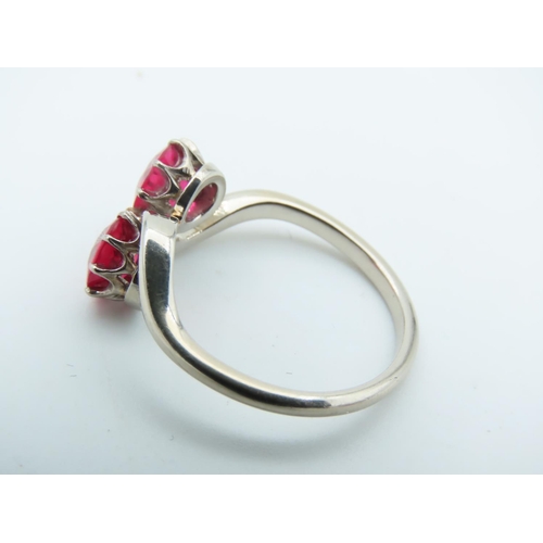 714 - Ruby Two Stone Crossover Ring Mounted on 9 Carat Gold Size K and a Half