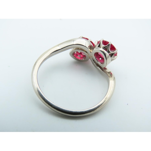 714 - Ruby Two Stone Crossover Ring Mounted on 9 Carat Gold Size K and a Half