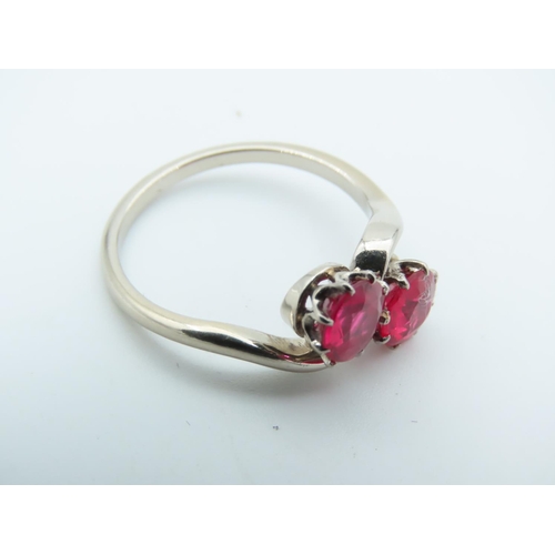 714 - Ruby Two Stone Crossover Ring Mounted on 9 Carat Gold Size K and a Half