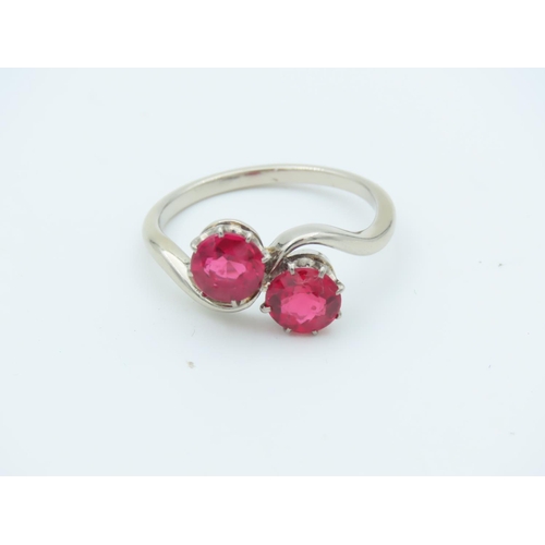 714 - Ruby Two Stone Crossover Ring Mounted on 9 Carat Gold Size K and a Half