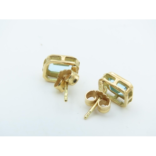 717 - Pair of 18 Carat Yellow Gold Mounted Blue Topaz Set Ear Studs Each with Emerald Blue Topaz Raised Co... 