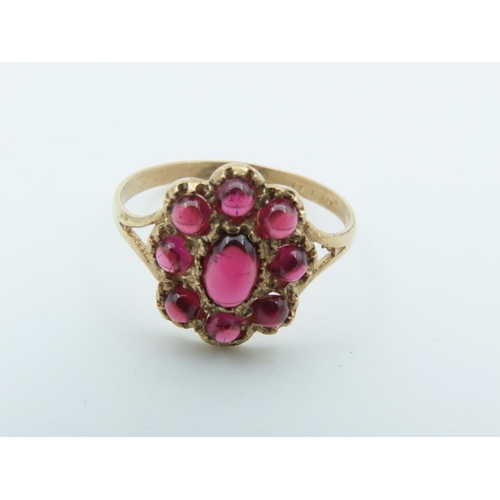 723 - Garnet Set Ladies Cluster Ring Mounted on 9 Carat Gold Size Q and a Half