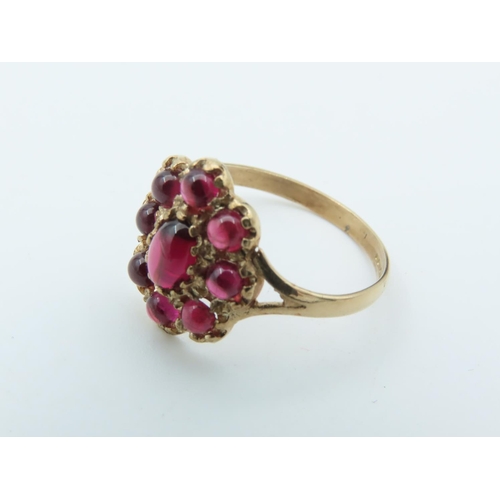 723 - Garnet Set Ladies Cluster Ring Mounted on 9 Carat Gold Size Q and a Half