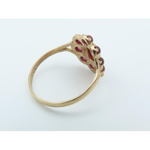 723 - Garnet Set Ladies Cluster Ring Mounted on 9 Carat Gold Size Q and a Half