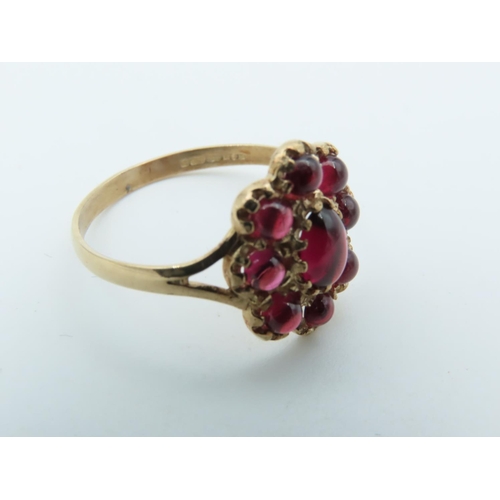 723 - Garnet Set Ladies Cluster Ring Mounted on 9 Carat Gold Size Q and a Half