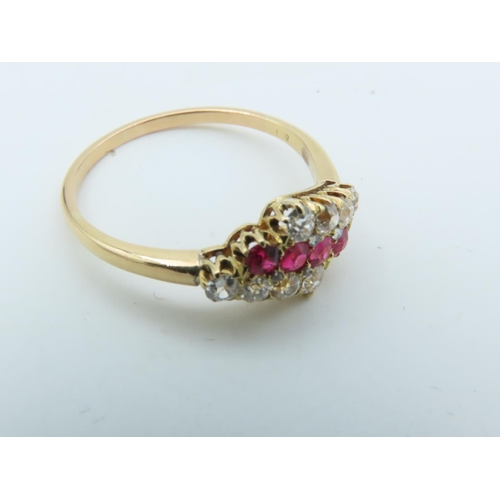 727 - Ruby and Diamond Ladies Ring Gentle Diagonal Line of Four Round Cut Rubies between Similar Lines of ... 