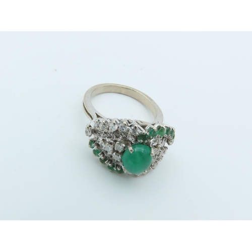 729 - Emerald and Diamond Ladies Cluster Ring with Central Oval Cabochon Emerald with Trio of Single Cut D... 