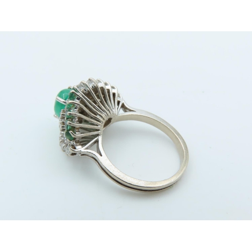 729 - Emerald and Diamond Ladies Cluster Ring with Central Oval Cabochon Emerald with Trio of Single Cut D... 