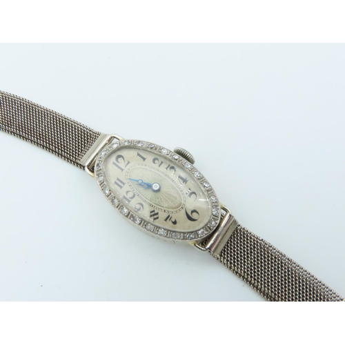 732 - Ladies 18 Carat Gold and Diamond Set Cocktail Watch Circa 1927 Oval Dial 12mm Diameter with Arabic N... 