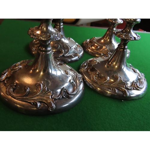 734 - Set of Four Silver Plated Candle Sticks Antique Each Decorated with Applied Foliate and Scroll Decor... 