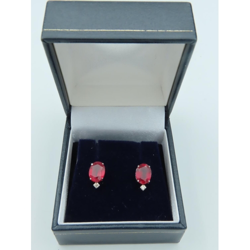 756 - Pair of 18 Carat White Gold Mounted Ruby and Diamond Ladies Earrings Rubies 8mm High x 6mm Wide Attr... 