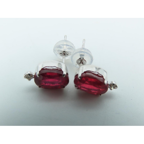 756 - Pair of 18 Carat White Gold Mounted Ruby and Diamond Ladies Earrings Rubies 8mm High x 6mm Wide Attr... 