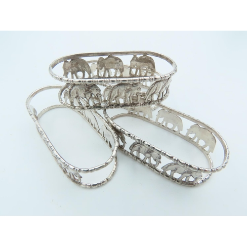 786 - Set of Four Solid Silver Napkin Rings Elephant Motifs