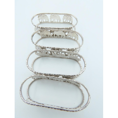 786 - Set of Four Solid Silver Napkin Rings Elephant Motifs