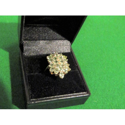 827 - Peridot Ladies Cluster Ring Mounted on 9 Carat Gold Band Ring Size O