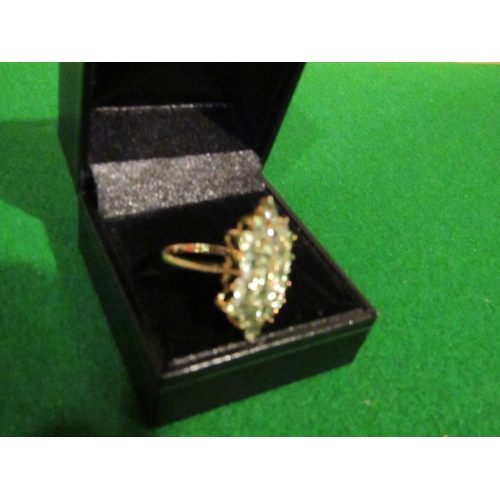 827 - Peridot Ladies Cluster Ring Mounted on 9 Carat Gold Band Ring Size O