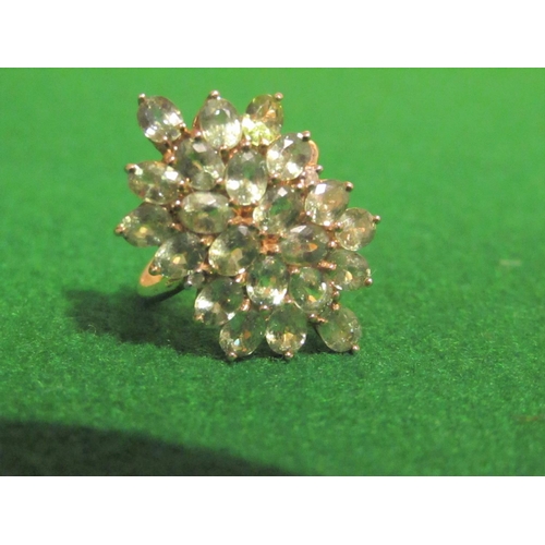 827 - Peridot Ladies Cluster Ring Mounted on 9 Carat Gold Band Ring Size O