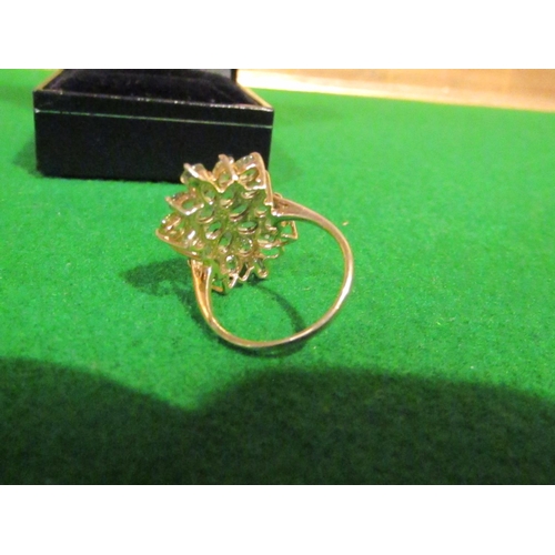 827 - Peridot Ladies Cluster Ring Mounted on 9 Carat Gold Band Ring Size O