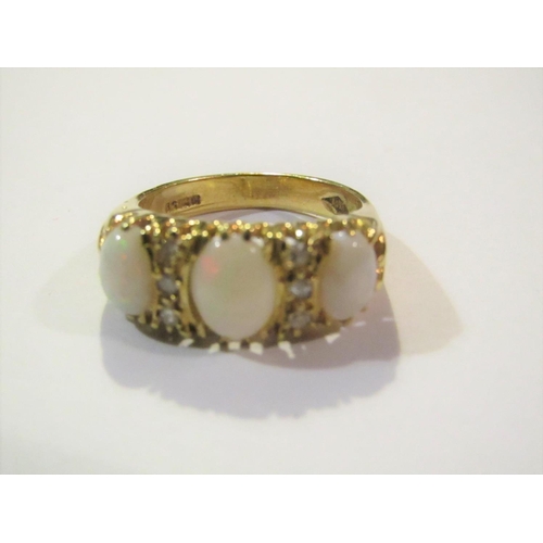 831 - Ladies 18 Carat Yellow Gold Mounted Opal Ring with Good Pinfire Size O