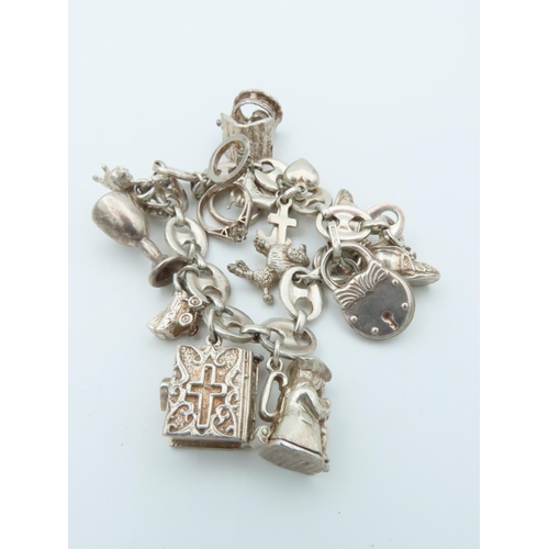 833 - Solid Silver Charm Bracelet Laden with Various Charms including Tankard and Other Motifs