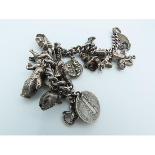 836 - Solid Silver Ladies Charm Bracelet Laden with Various Charms