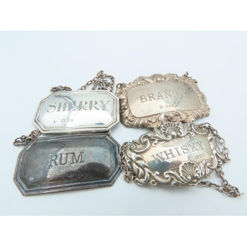 845 - Four Solid Silver Decanter Labels Sherry, Brandy, Rum and Whisky Each Hallmarked