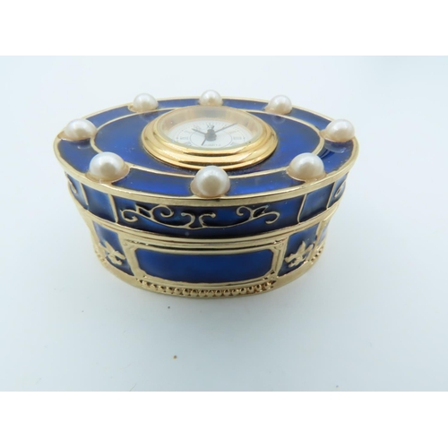 847 - Enamel Decorated Oval Form Pill or Ring Box Approximately 3 Inches Diameter with Inset Time Piece