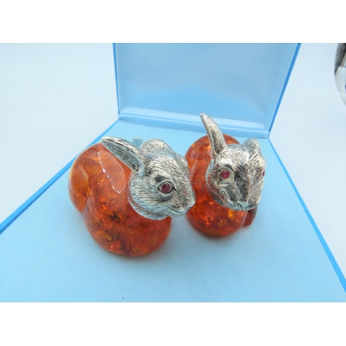 863 - Pair of Solid Silver Mounted Amber Set Rabbit Figures